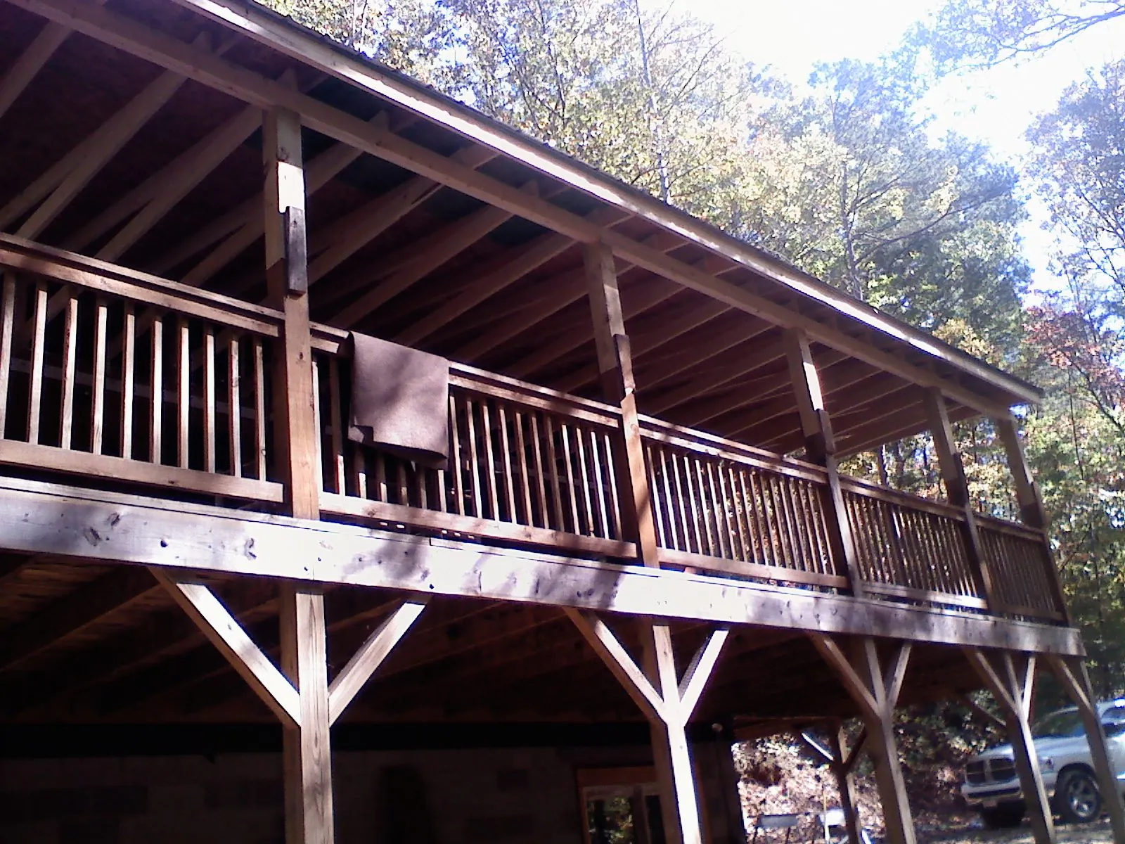 Timber framing under a new elevated porch and deck — Roof Leak Repair in Alma by Roofing Brothers